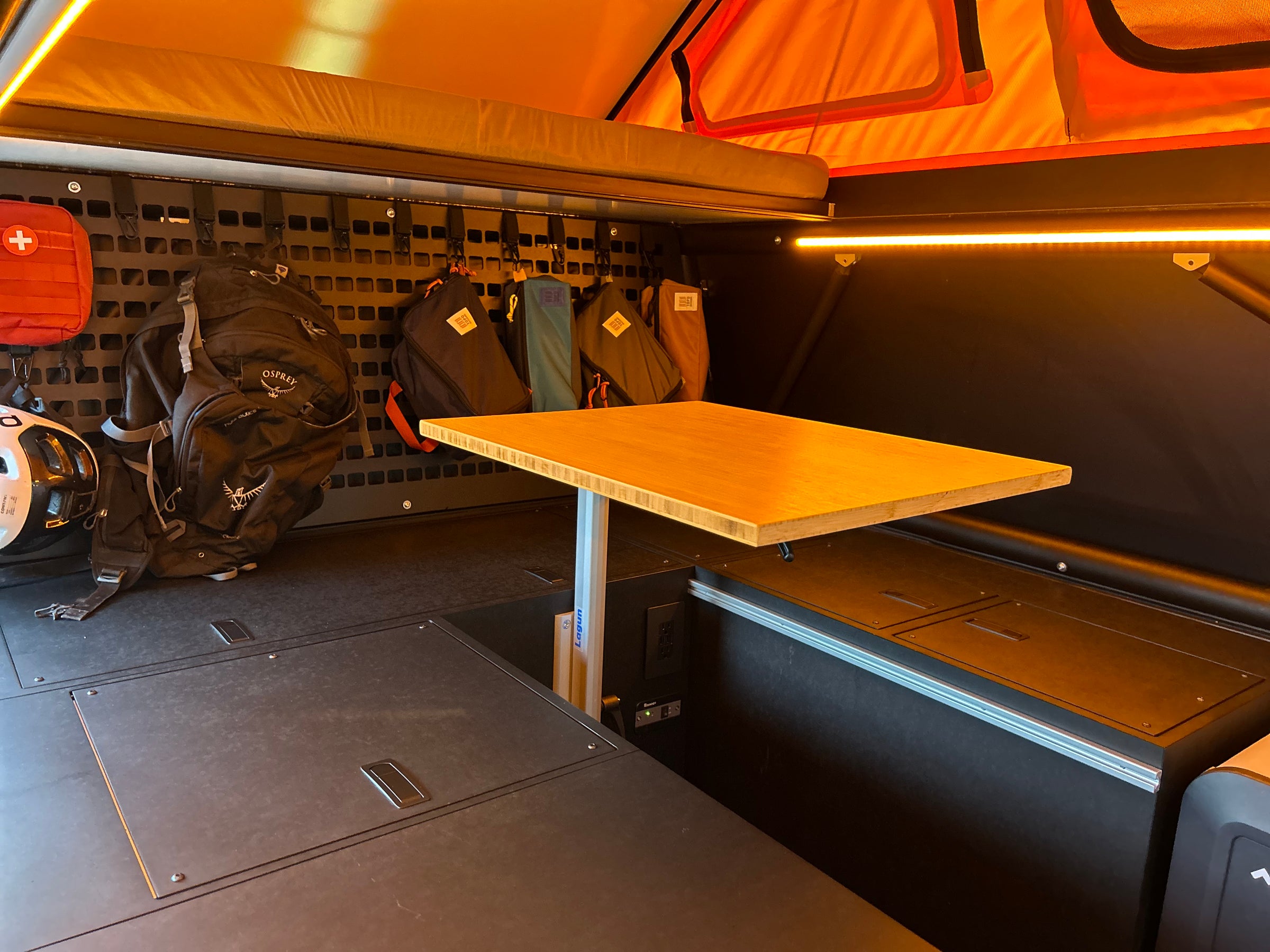 GFC Overland Camper - interior seating and orange mood lighting