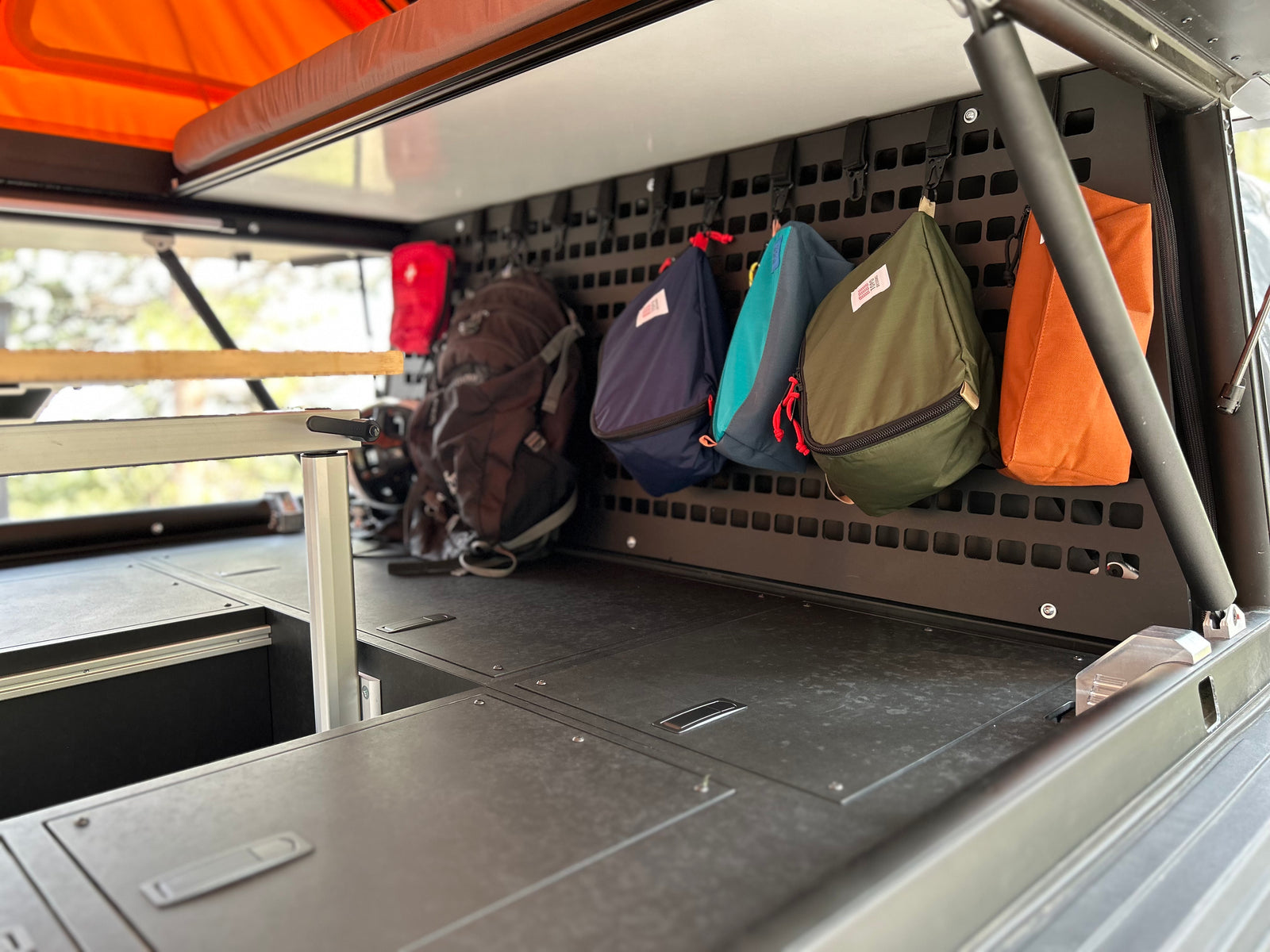 Go Fast Camper (GFC) build - Interior storage cabinets & molle panel with bag storage