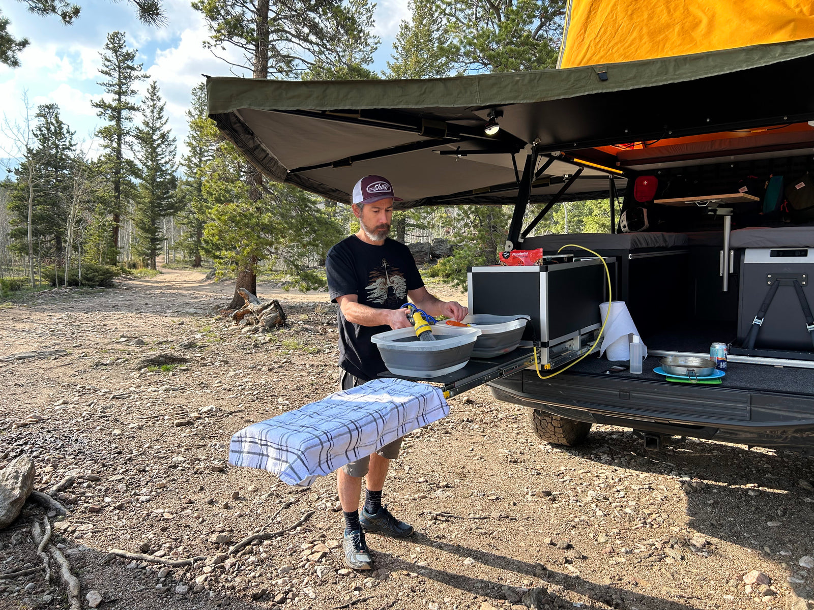 Go Fast Camper (GFC) build - Slide out camp kitchen washing dishes with Geyser System